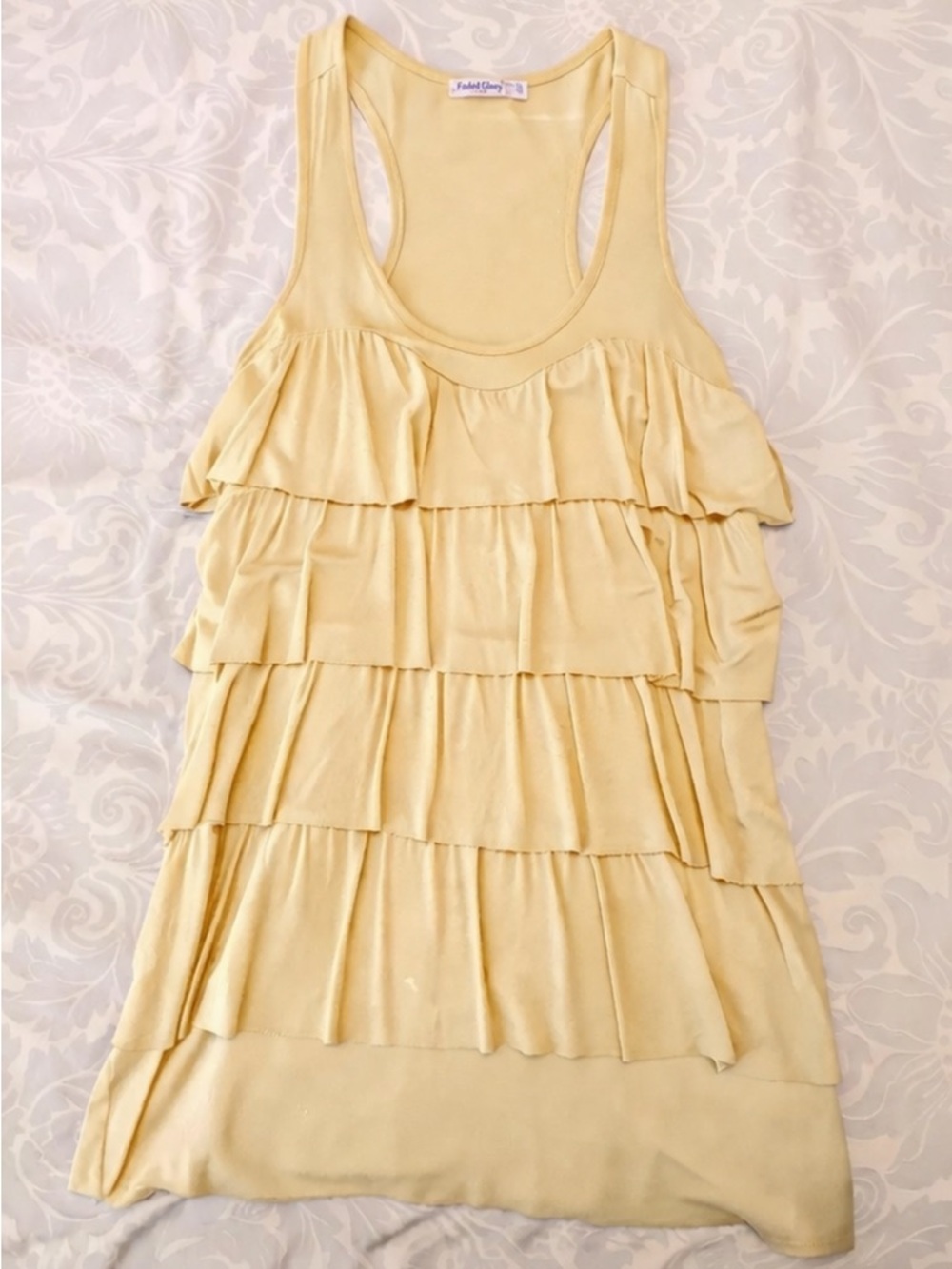 in search of!!! Aritzia frill ruffled tank top